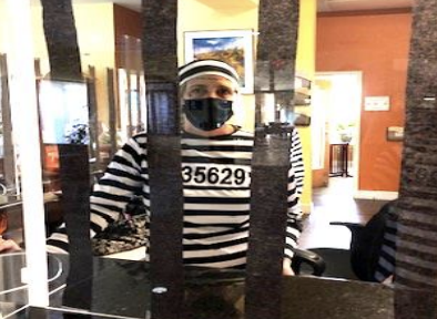 A staff member dressed up as a person incarcerated.