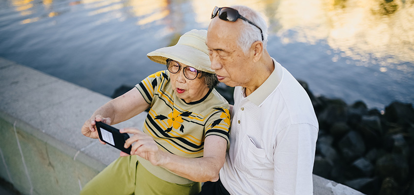 Elderly couple taking a selfie